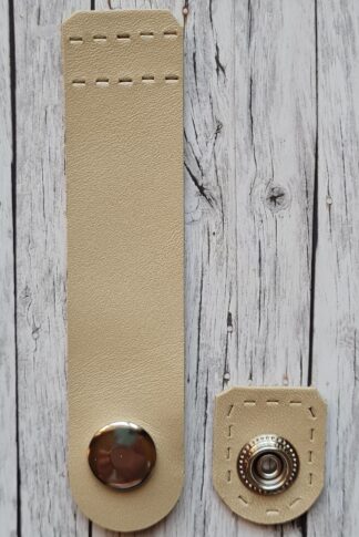 Dotti gyöngyház pezsgő bőr táskazáró pánt